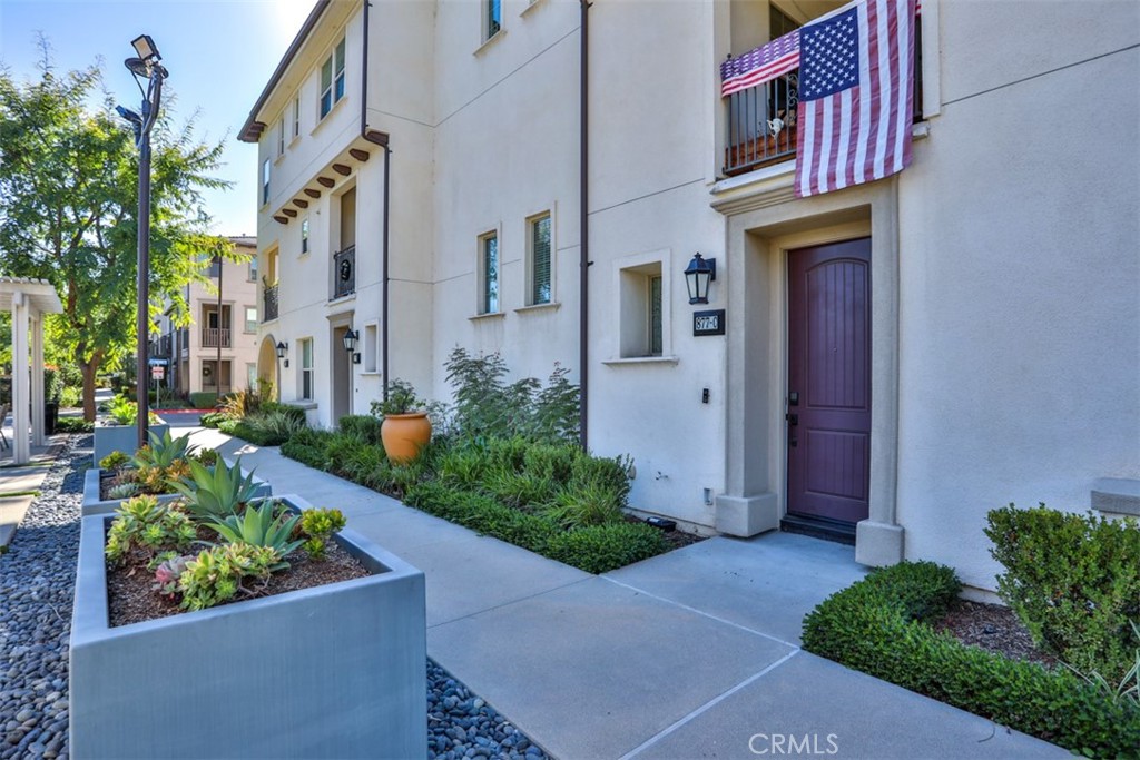 877 Orchid Way Azusa, CA 91702 - Photo 6 of 40 a view of a house with potted plants
