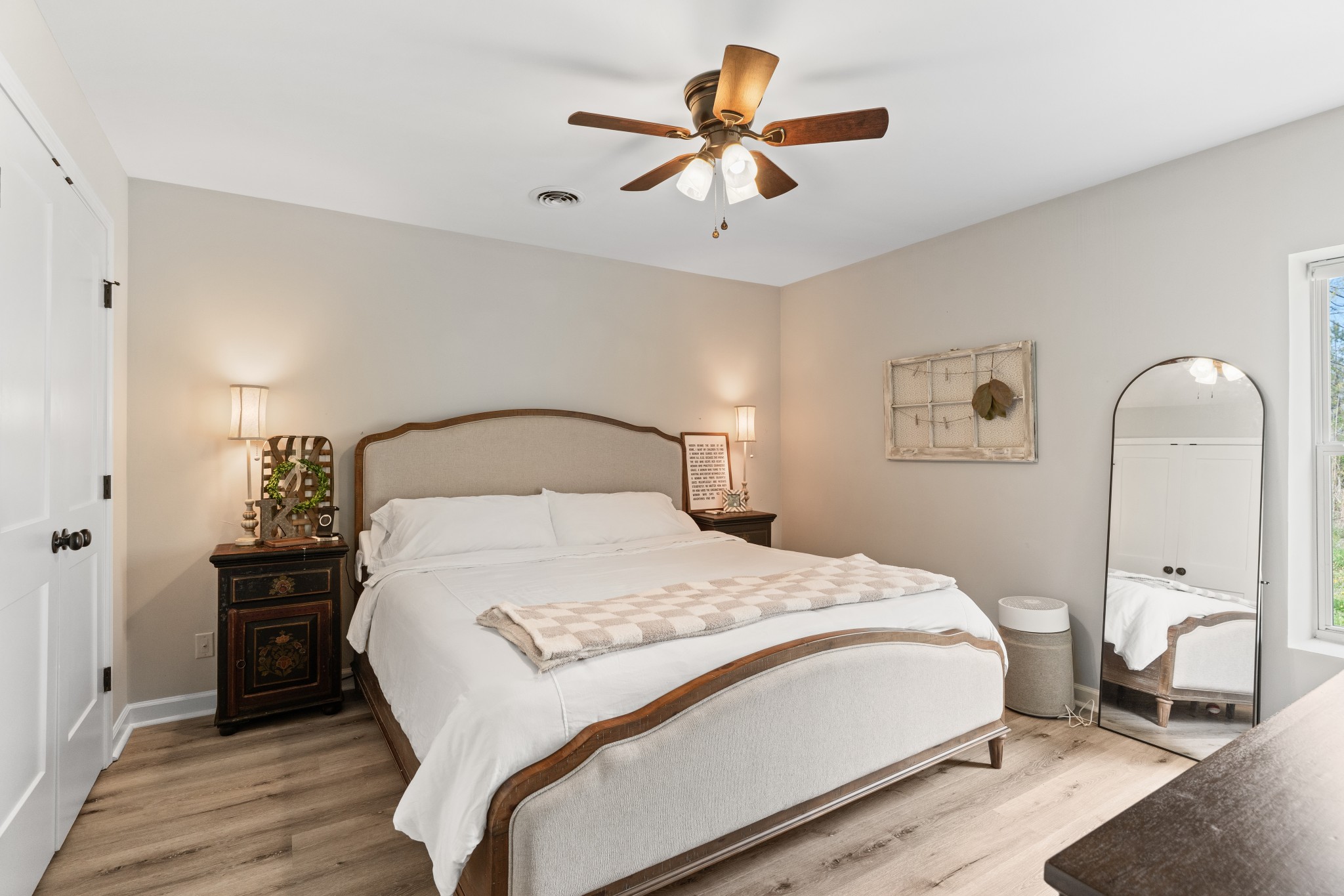 2957 Distillery Road Greenbrier, TN 37073 - Photo 15 of 41 a bedroom with a bed and a chandelier