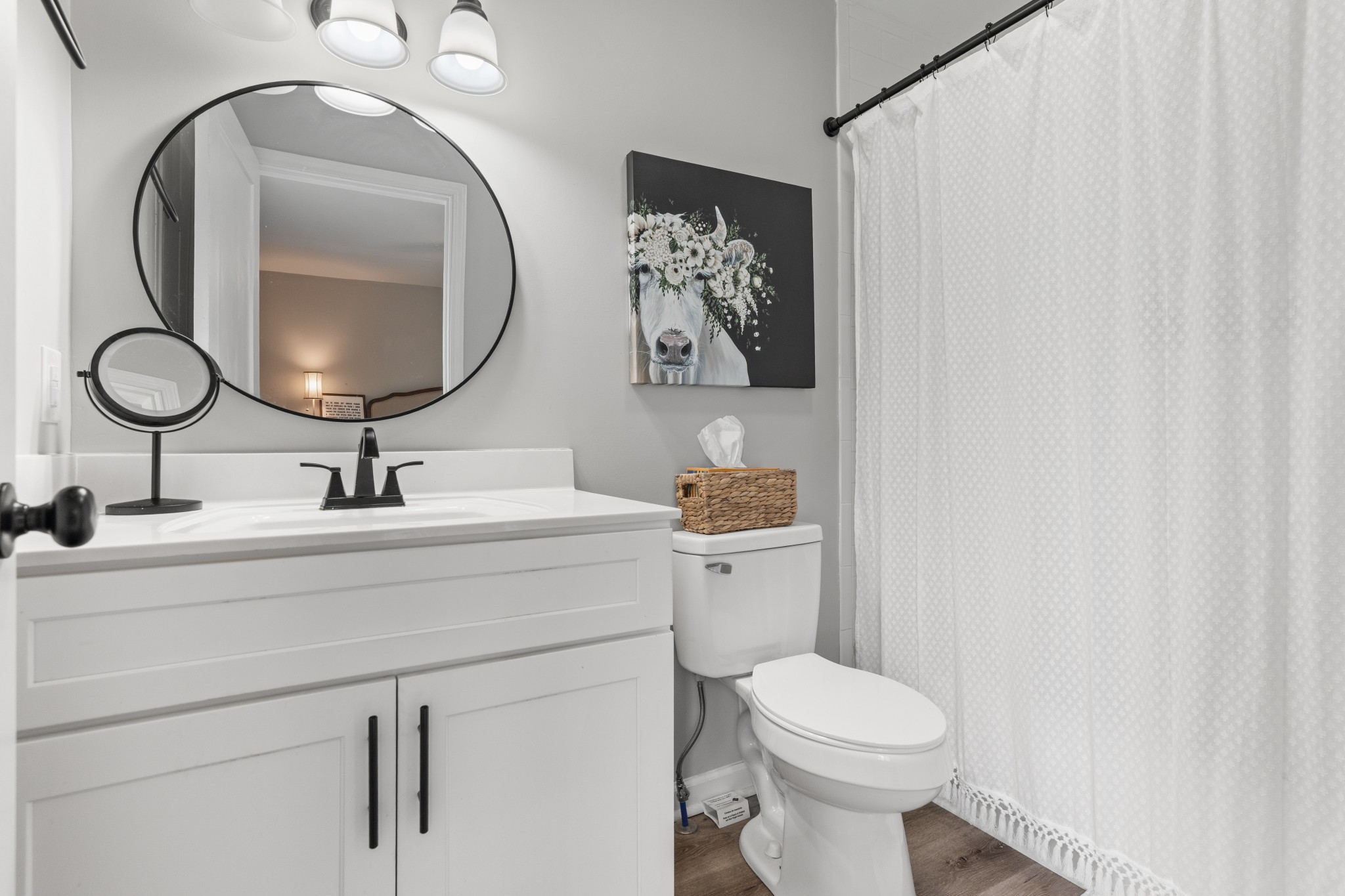 2957 Distillery Road Greenbrier, TN 37073 - Photo 17 of 41 a bathroom with a toilet a sink and mirror