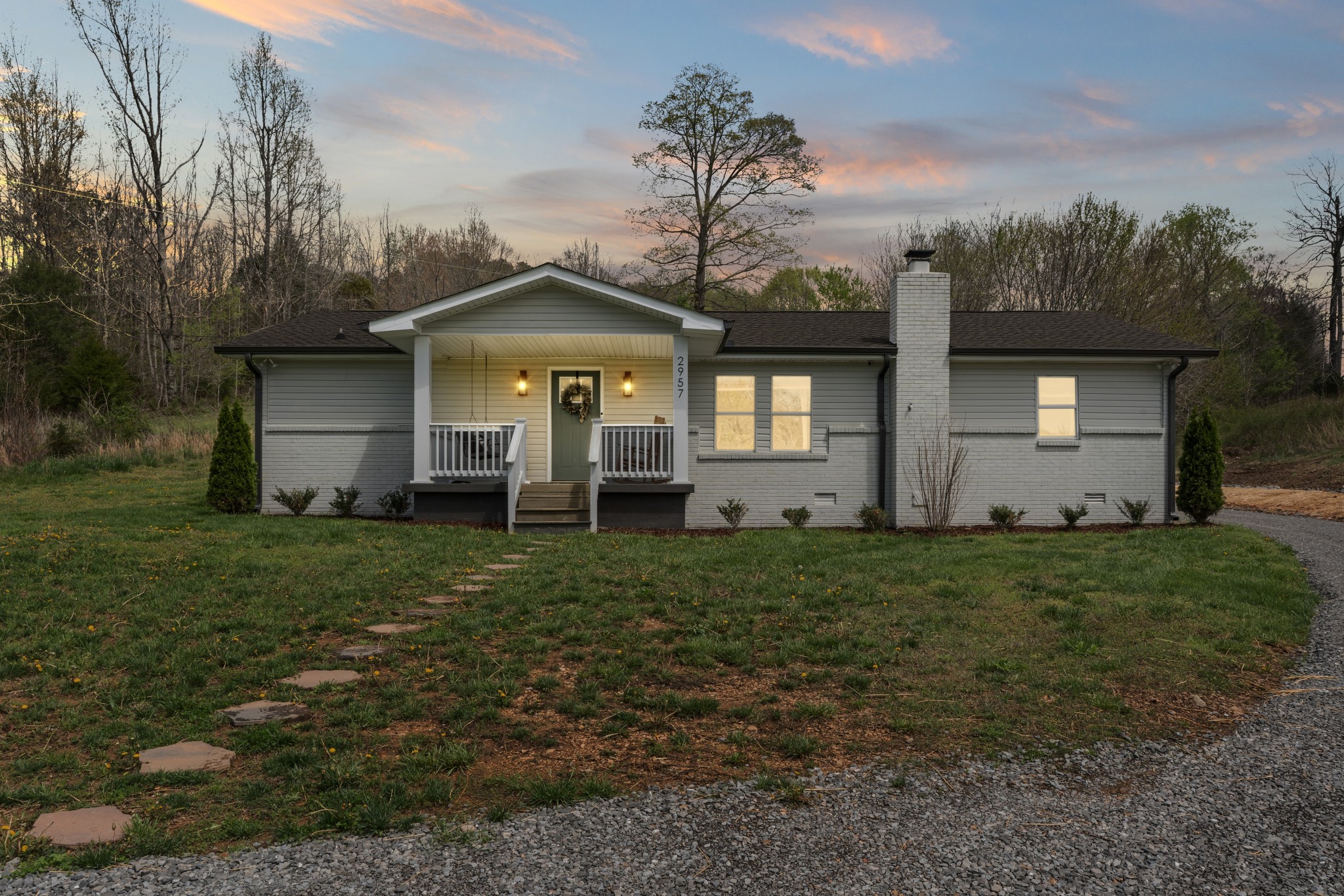 2957 Distillery Road Greenbrier, TN 37073 - Photo 2 of 41 a front view of a house with a garden