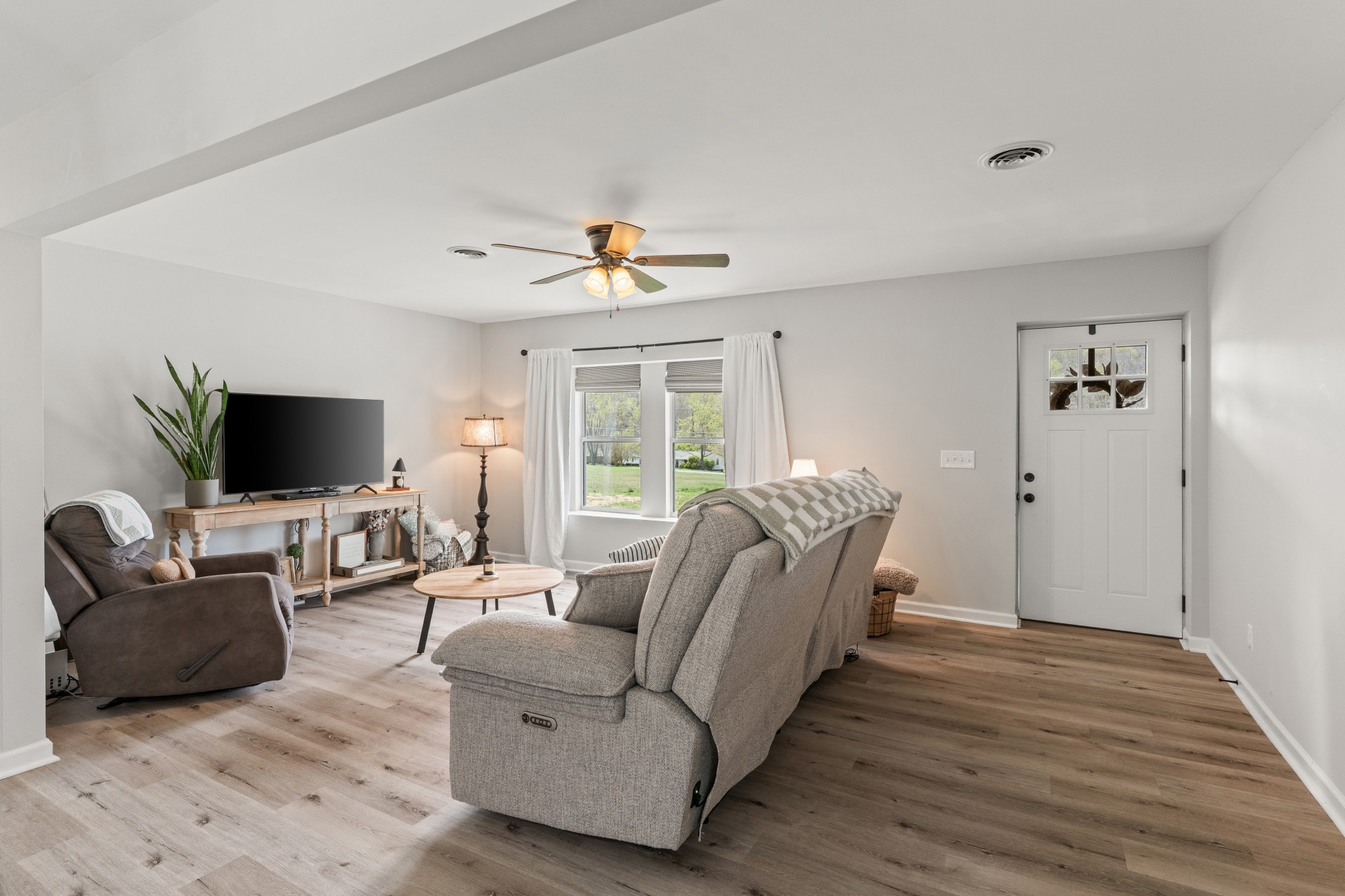 2957 Distillery Road Greenbrier, TN 37073 - Photo 7 of 41 a living room with furniture and a flat screen tv