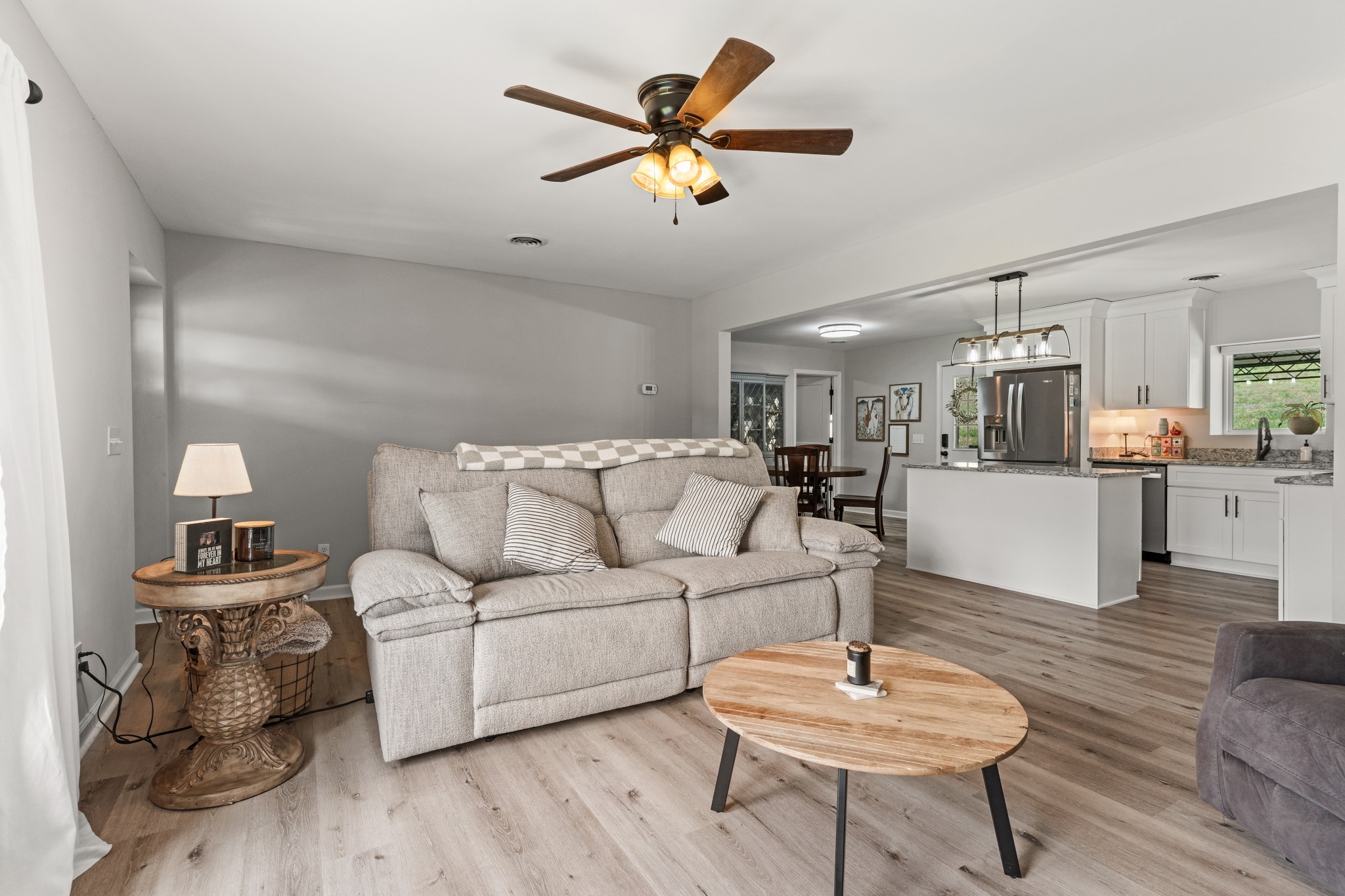 2957 Distillery Road Greenbrier, TN 37073 - Photo 8 of 41 a living room with furniture and kitchen view