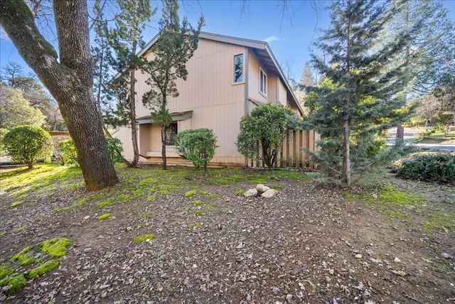 a backyard of a house with lots of green space