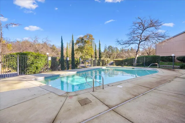 a view of a swimming pool and outdoor space