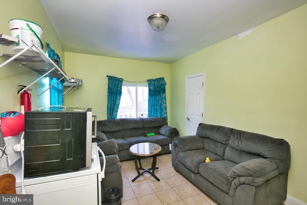 430 Priscilla Street Salisbury, MD 21804 - Photo 42 of 60 a living room with furniture and a window