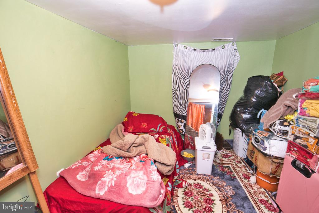 430 Priscilla Street Salisbury, MD 21804 - Photo 46 of 60 a room with furniture and a wooden floor