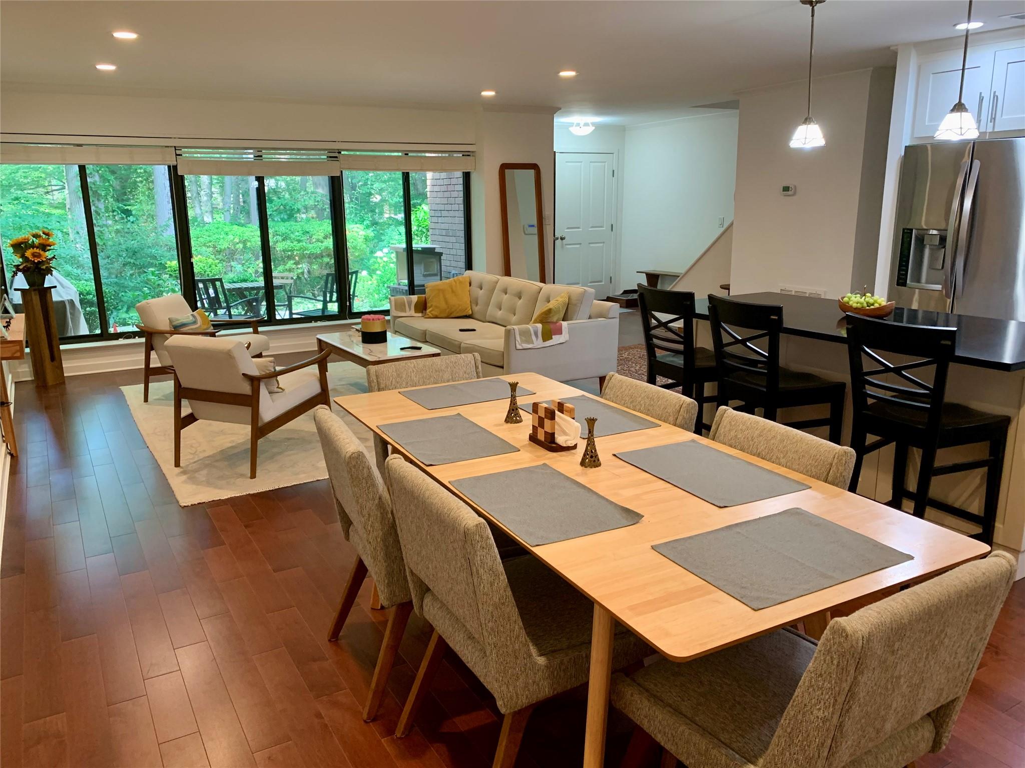 46 Spring Hollow Road Roslyn, NY 11576 - Photo 1 of 1 Dining room with dark wood-style flooring and recessed lighting