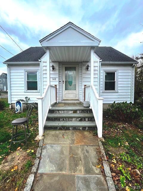 a front view of a house with a porch