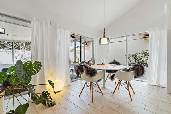 a view of a livingroom with furniture and a table