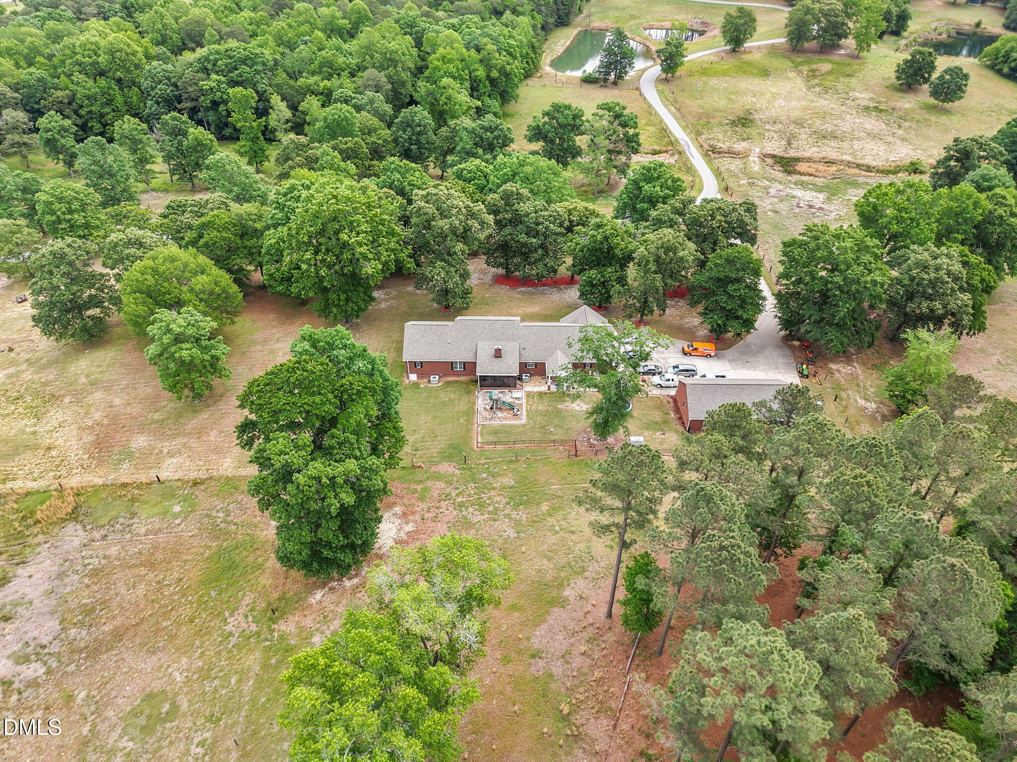 2880 Elevation Road Four Oaks, NC 27524 - Photo 4 of 51 an aerial view of residential house with outdoor space and trees all around