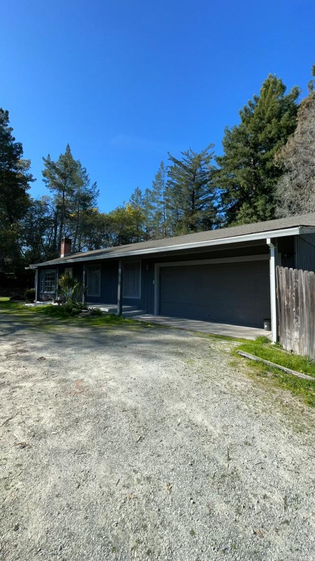 11151 Cherry Ridge Road Sebastopol, CA 95472 - Photo 1 of 1 a backyard of a house with lots of green space