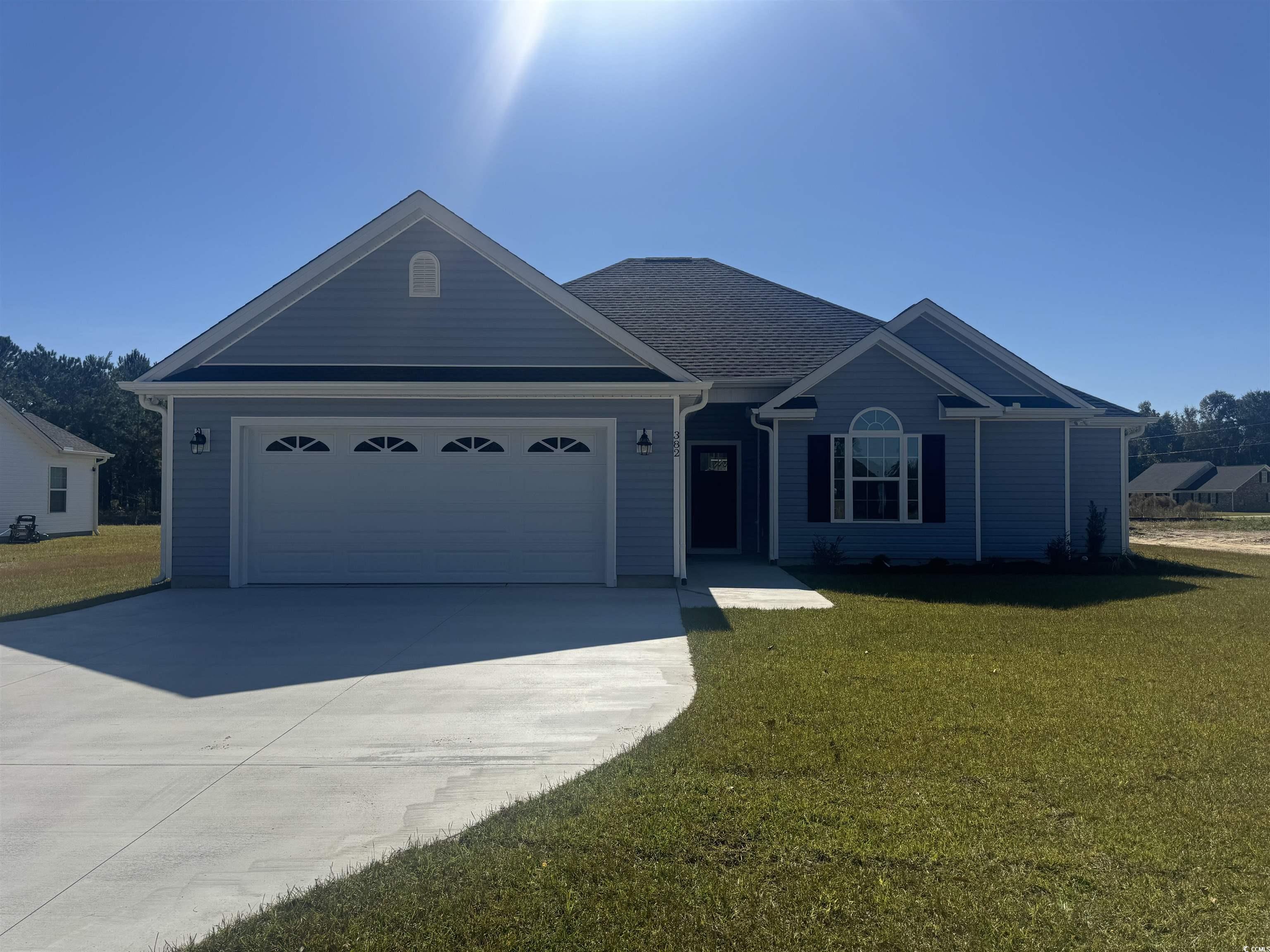 382 William Nobles Road Aynor, SC 29511 - Photo 1 of 36 Ranch-style house featuring a front yard, driveway, and an attached garage