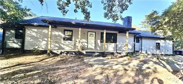 a view of a house with a patio
