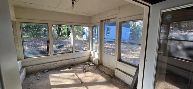 an empty room with windows