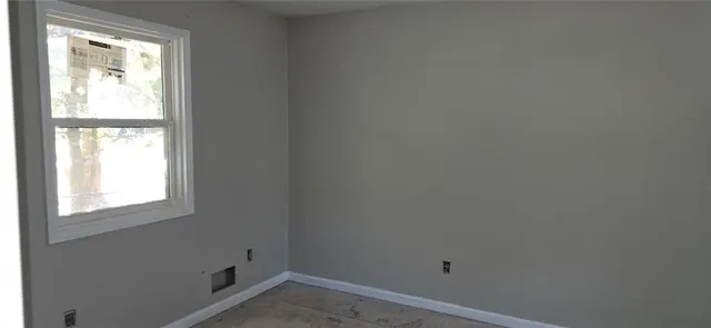 an empty room with closet