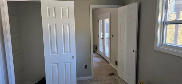 an empty room with windows