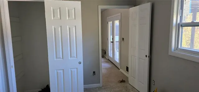 an empty room with windows