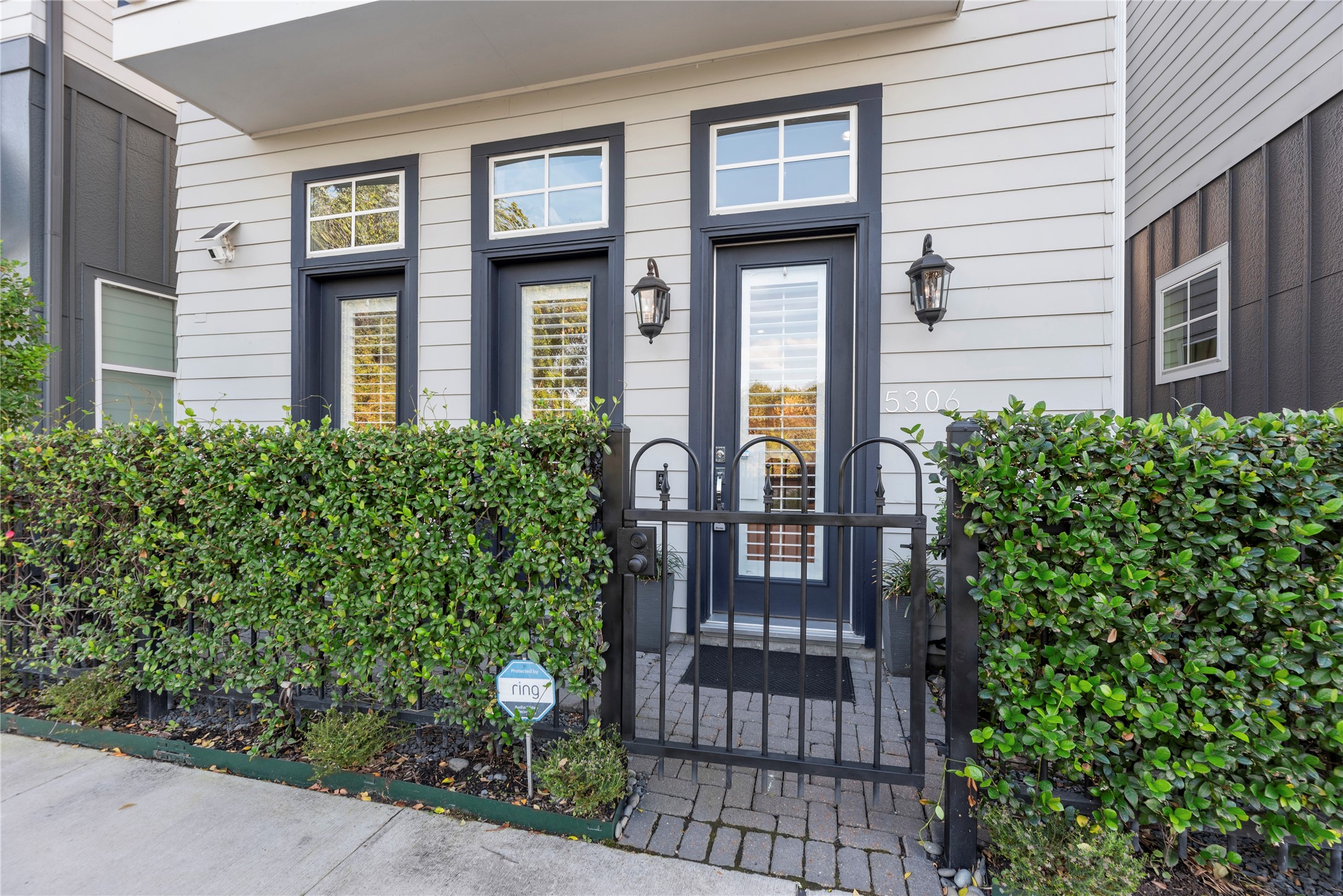 5306 South Capitol Street Houston, TX 77023 - Photo 2 of 28 a front view of a house with a garden