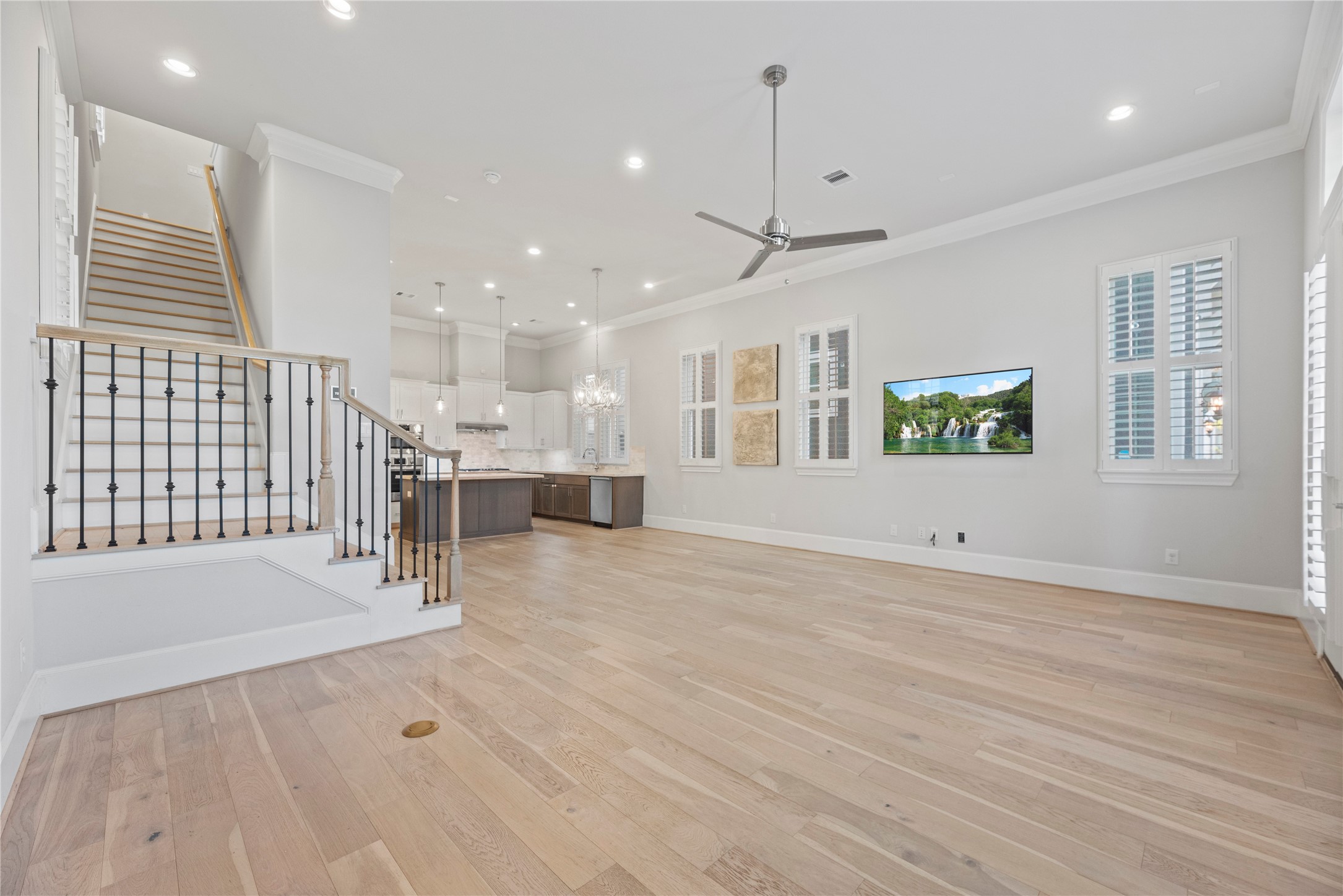 5306 South Capitol Street Houston, TX 77023 - Photo 23 of 28 a view of an empty room with wooden floor and windows