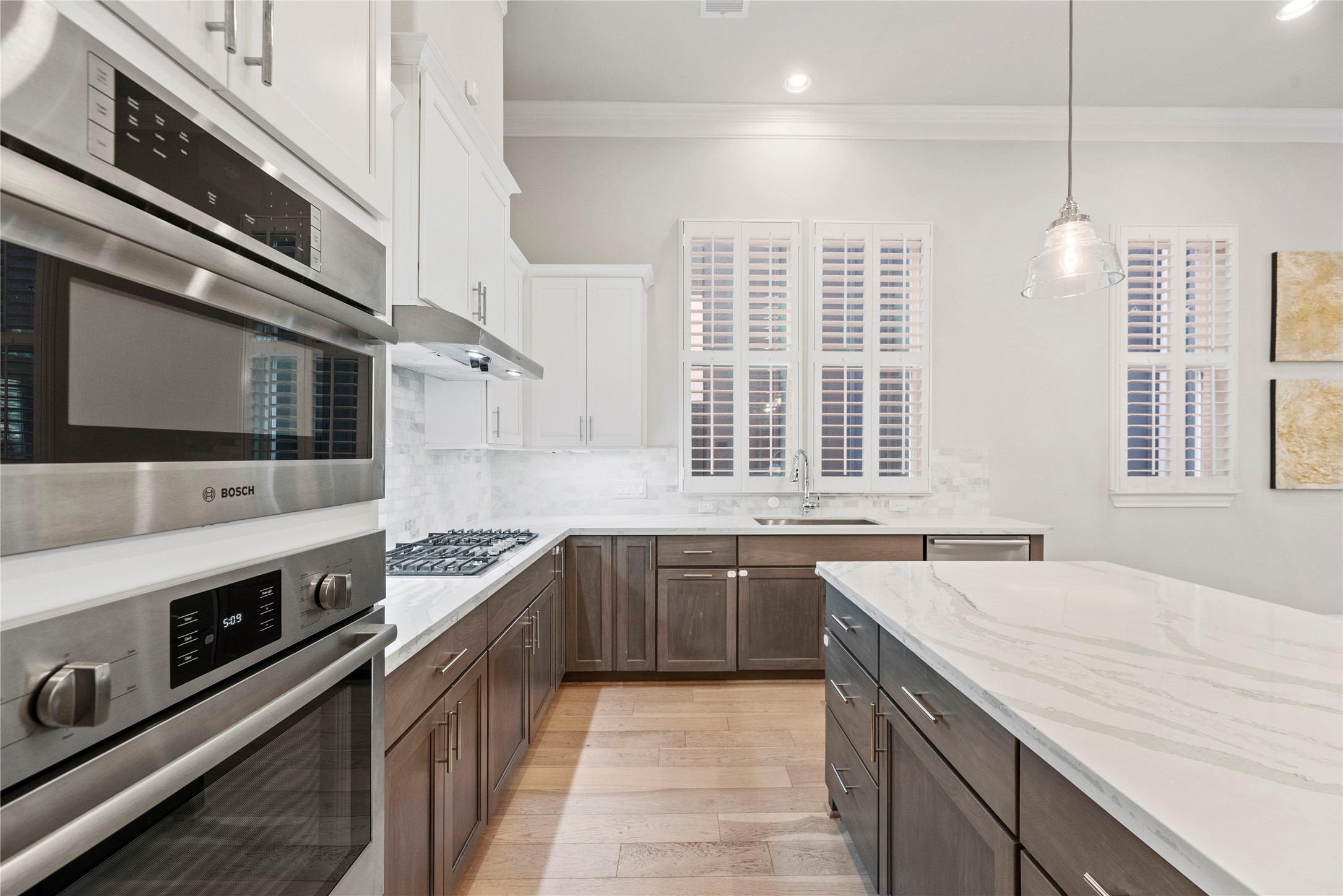5306 South Capitol Street Houston, TX 77023 - Photo 9 of 28 a large kitchen with stainless steel appliances granite countertop a sink and a stove