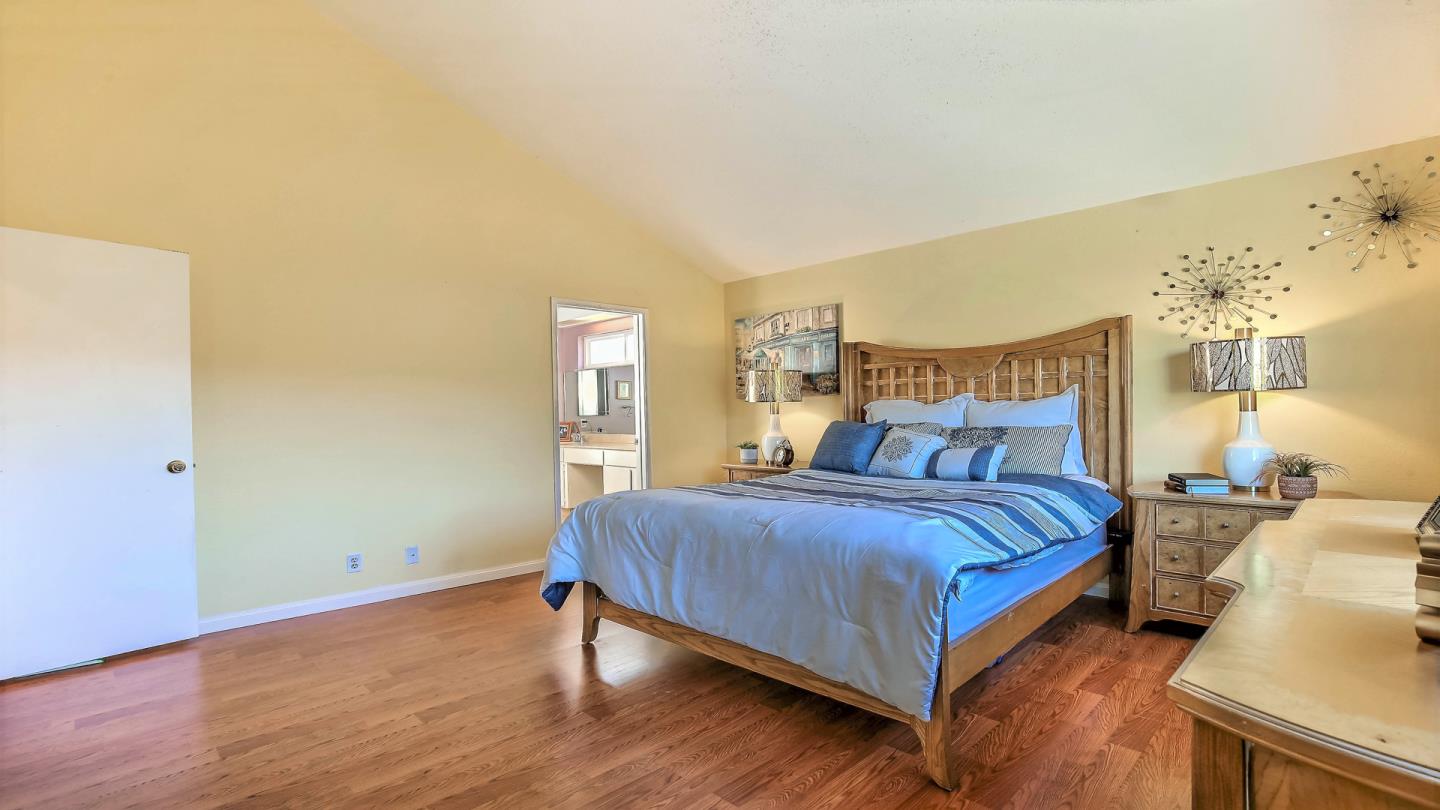 5709 Silver Leaf Road San Jose, CA 95138 - Photo 14 of 21 a bedroom with a bed and window