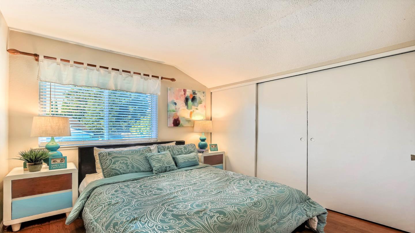 5709 Silver Leaf Road San Jose, CA 95138 - Photo 16 of 21 a bedroom with a large bed and a window
