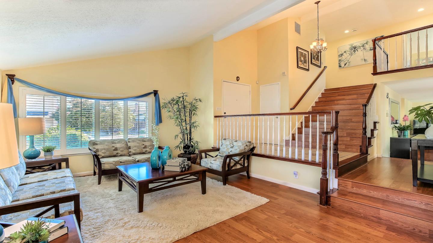 5709 Silver Leaf Road San Jose, CA 95138 - Photo 4 of 21 a living room with furniture and a table
