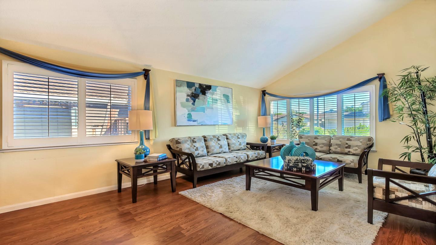 5709 Silver Leaf Road San Jose, CA 95138 - Photo 5 of 21 a living room with furniture and a large window