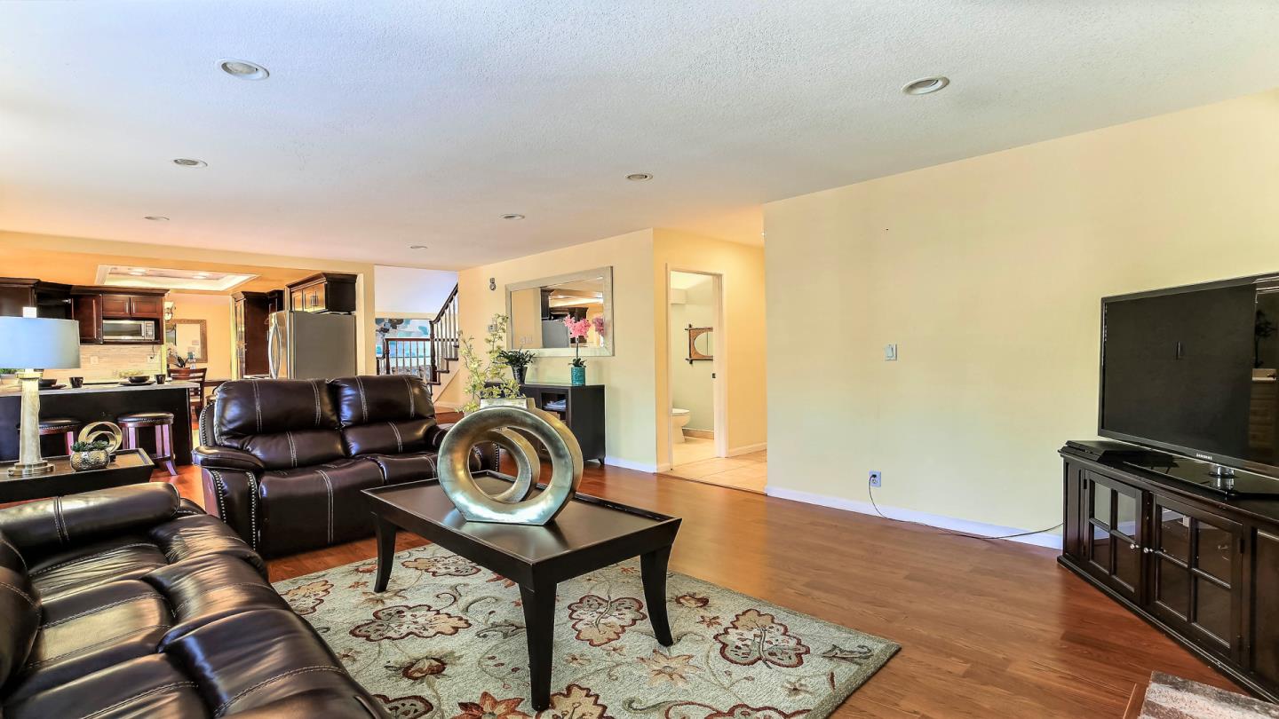 5709 Silver Leaf Road San Jose, CA 95138 - Photo 7 of 21 a living room with furniture and a flat screen tv