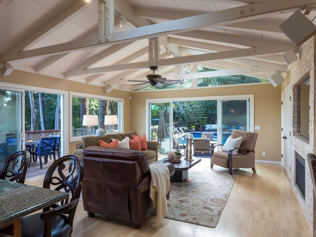 518 Patrol Road Woodside, CA 94062 - Photo 12 of 37 a living room with furniture and large windows