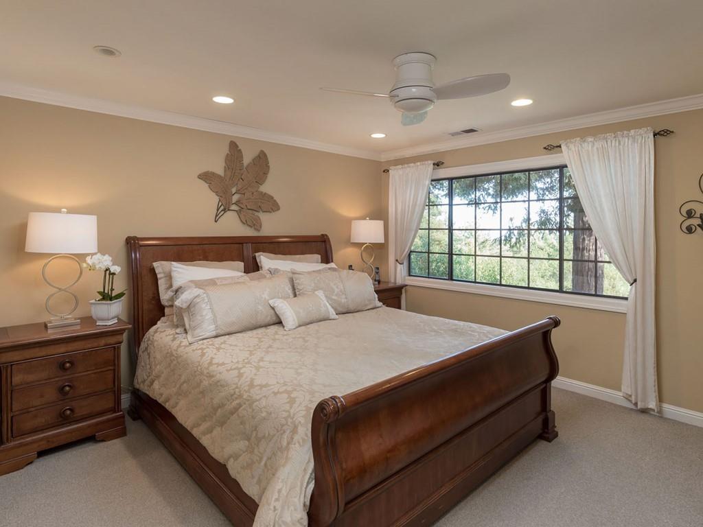 518 Patrol Road Woodside, CA 94062 - Photo 16 of 37 a bedroom with bed and window