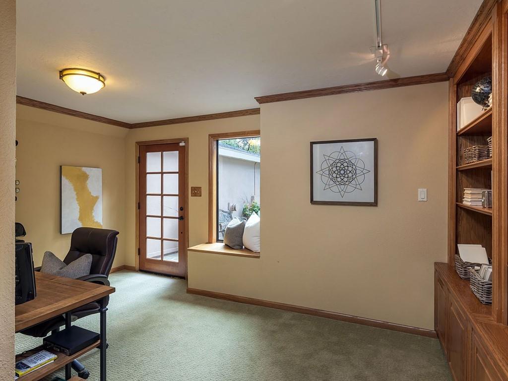 518 Patrol Road Woodside, CA 94062 - Photo 25 of 37 a view of a workspace with furniture and a window