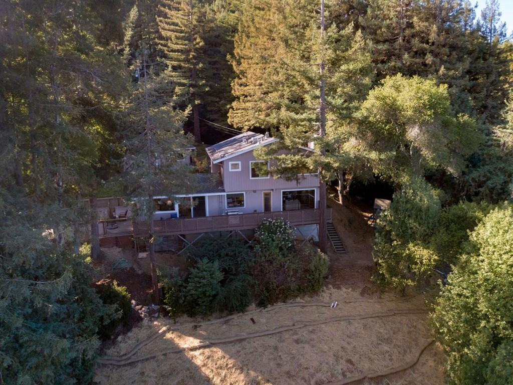 518 Patrol Road Woodside, CA 94062 - Photo 31 of 37 a view of a house with a yard