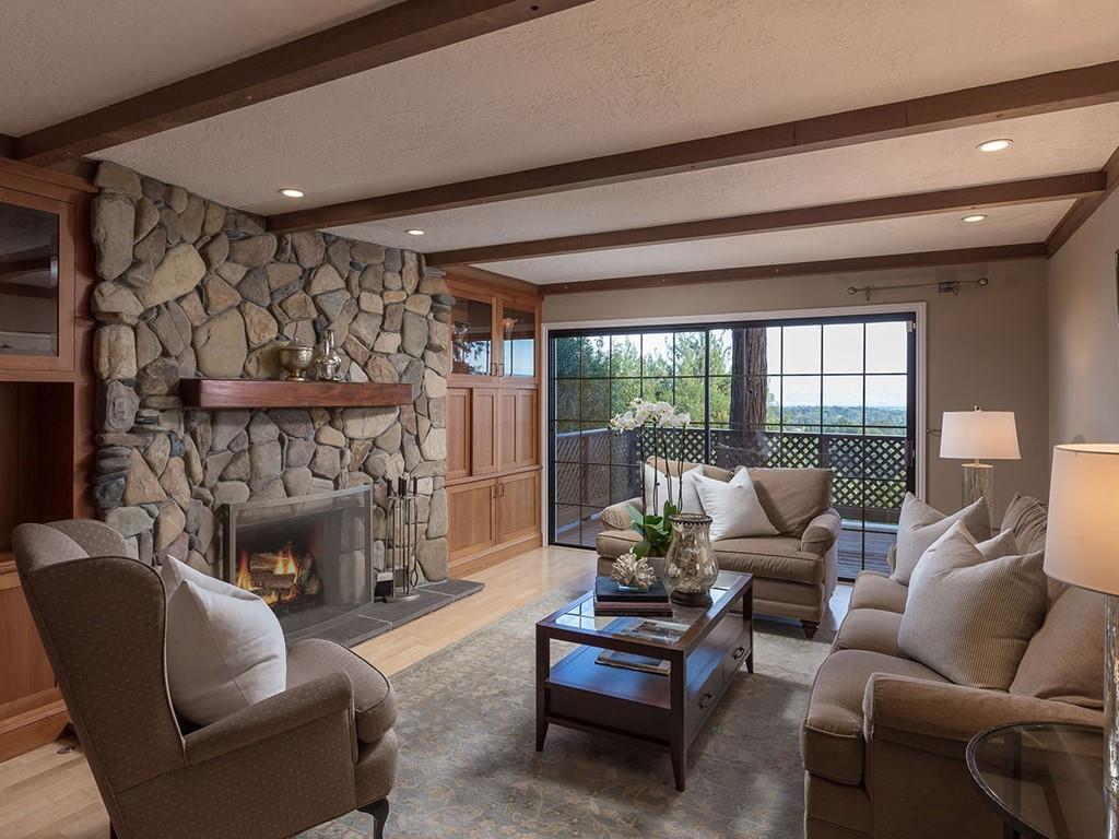 518 Patrol Road Woodside, CA 94062 - Photo 5 of 37 a living room with furniture and a fireplace