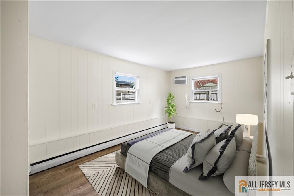 67 Drake Place Colonia, NJ 07067 - Photo 20 of 31 a bedroom with a bed and a window