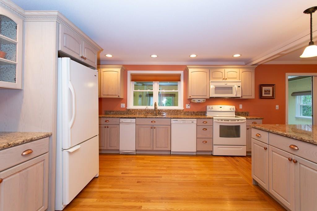 79 Wenonah Road Longmeadow, MA 01106 - Photo 12 of 29 a kitchen with stainless steel appliances granite countertop a refrigerator and a stove top oven