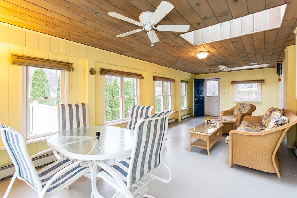 79 Wenonah Road Longmeadow, MA 01106 - Photo 14 of 29 a living room with furniture floor to ceiling window and a dining table