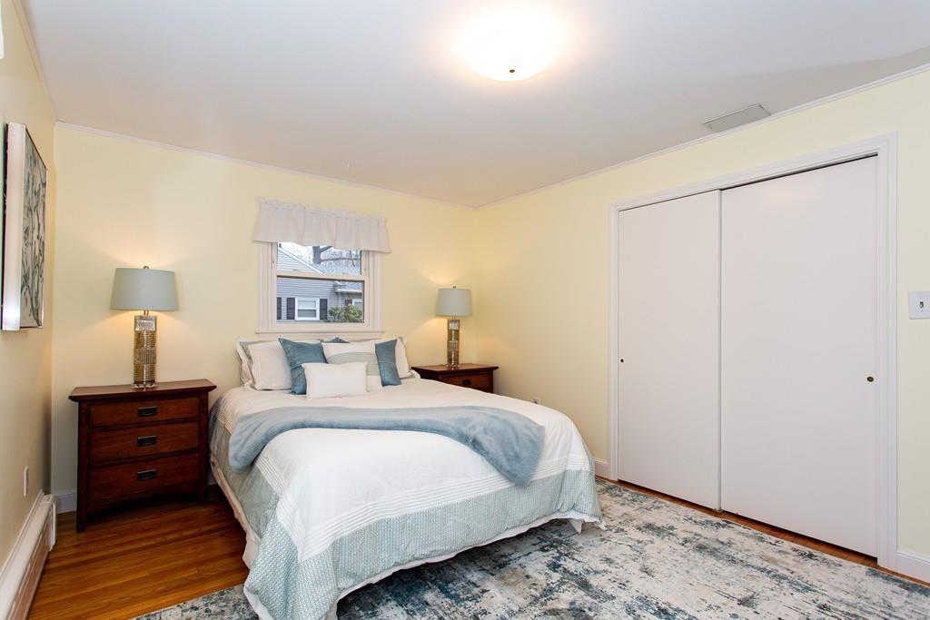 79 Wenonah Road Longmeadow, MA 01106 - Photo 19 of 29 a bedroom with a bed and a cabinets