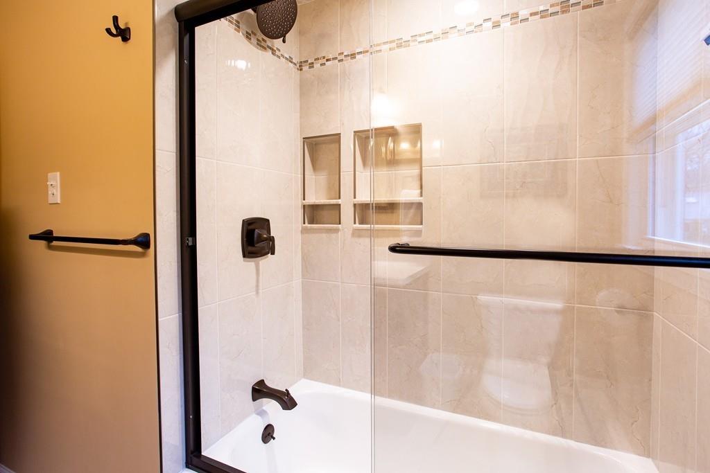 79 Wenonah Road Longmeadow, MA 01106 - Photo 21 of 29 a bathroom with a bathtub and shower