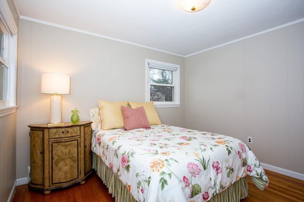 79 Wenonah Road Longmeadow, MA 01106 - Photo 23 of 29 a bedroom with a bed and a lamp