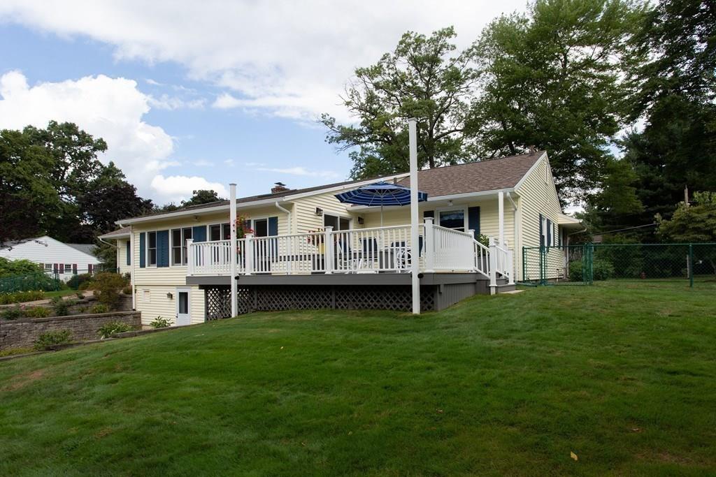 79 Wenonah Road Longmeadow, MA 01106 - Photo 26 of 29 a view of a white house with a big yard and large trees