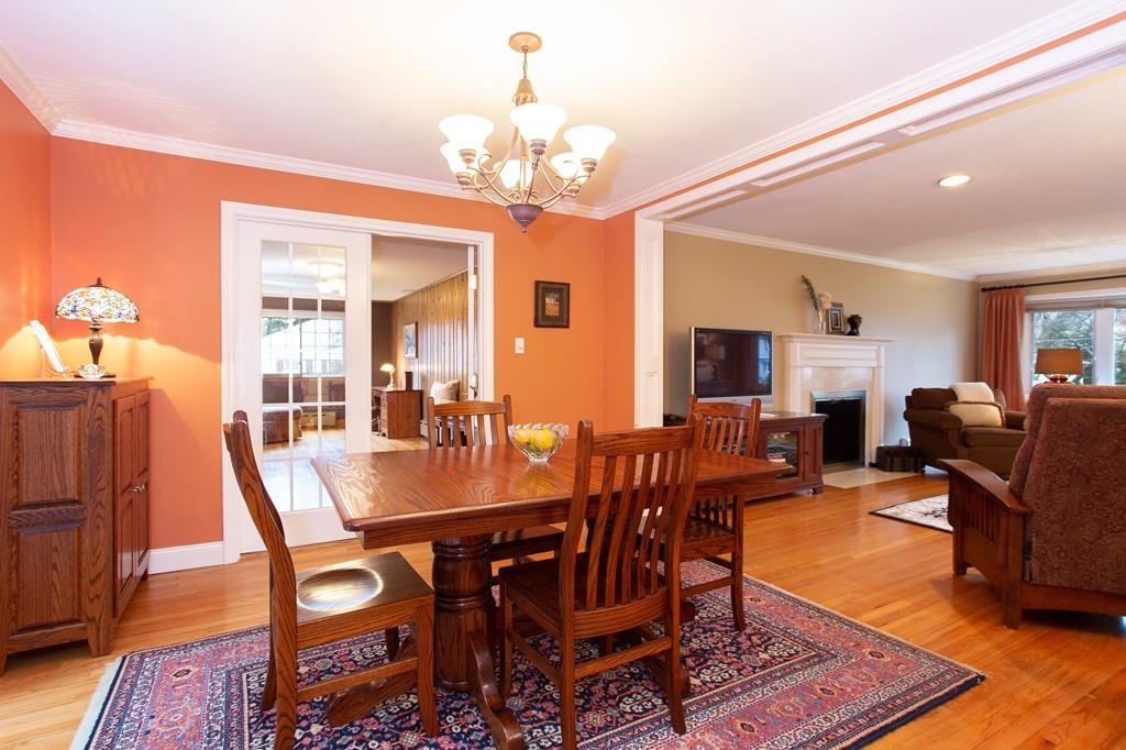 79 Wenonah Road Longmeadow, MA 01106 - Photo 8 of 29 a view of a dining room with furniture and a chandelier