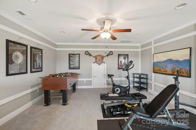 a room with furniture and wooden floor