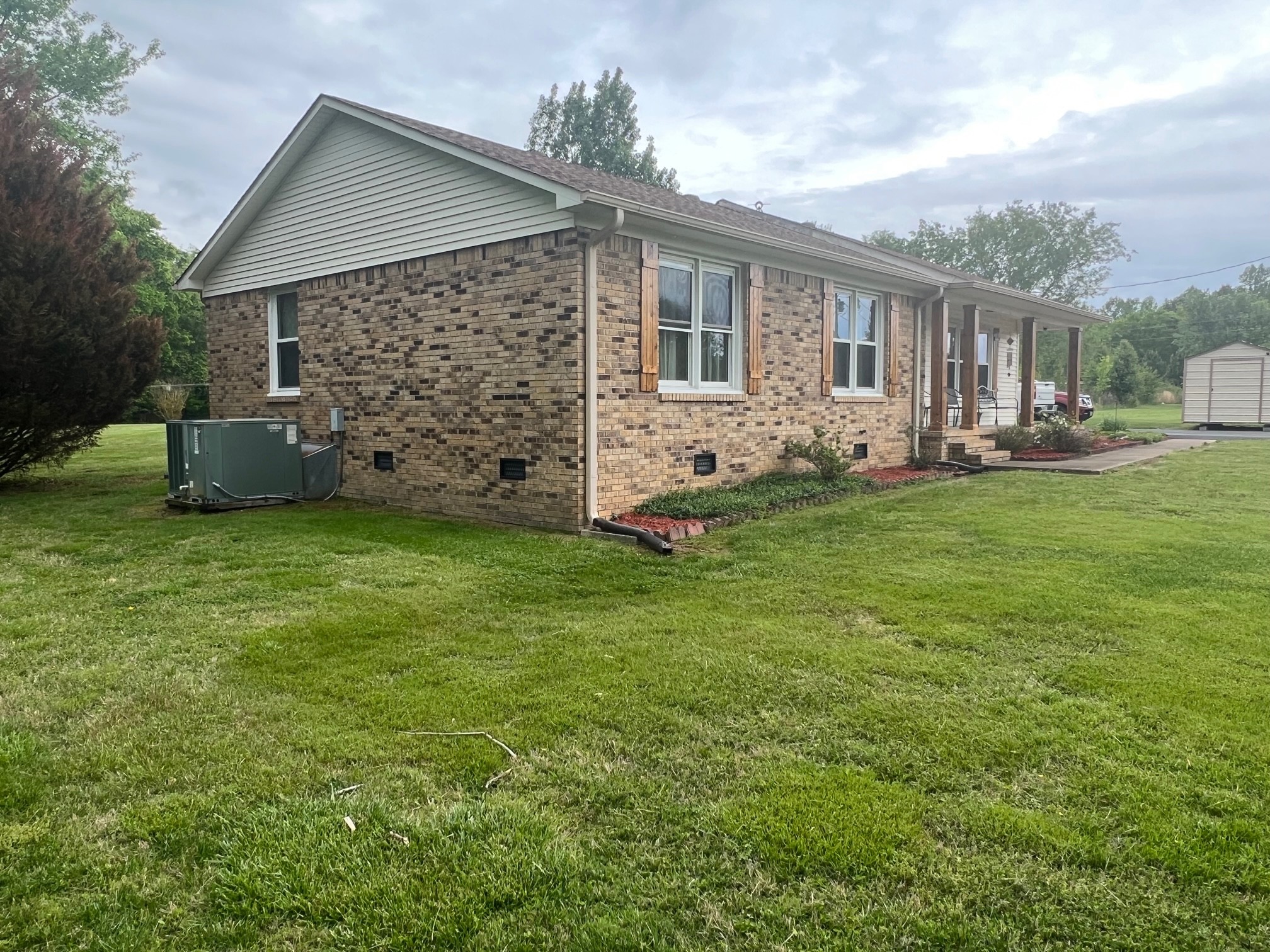 1653 Oak Grove Road Goodspring, TN 38460 - Photo 30 of 44 a front view of house with yard and green space