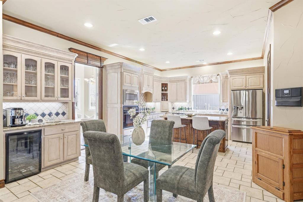 727 Madison Street Coppell, TX 75019 - Photo 14 of 36 a view of a dining room with furniture