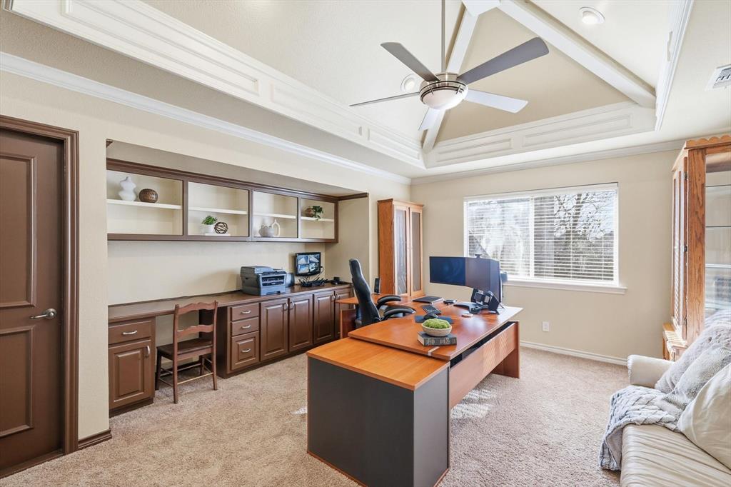 727 Madison Street Coppell, TX 75019 - Photo 21 of 36 a view of a workspace with furniture and a window