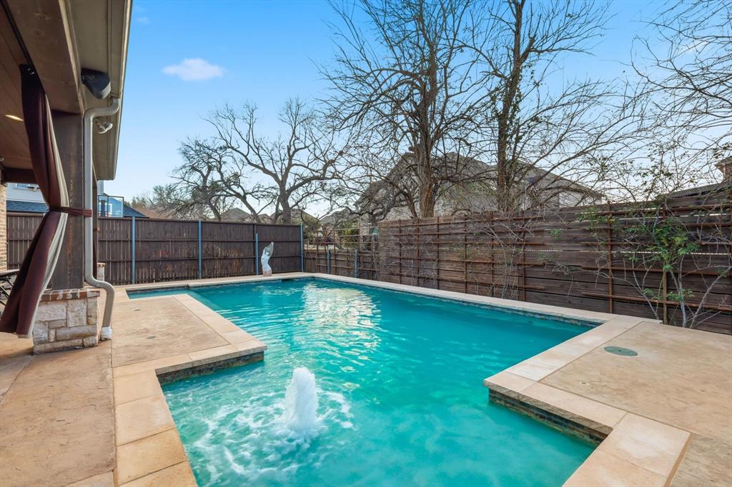727 Madison Street Coppell, TX 75019 - Photo 30 of 36 a view of a backyard with sitting area