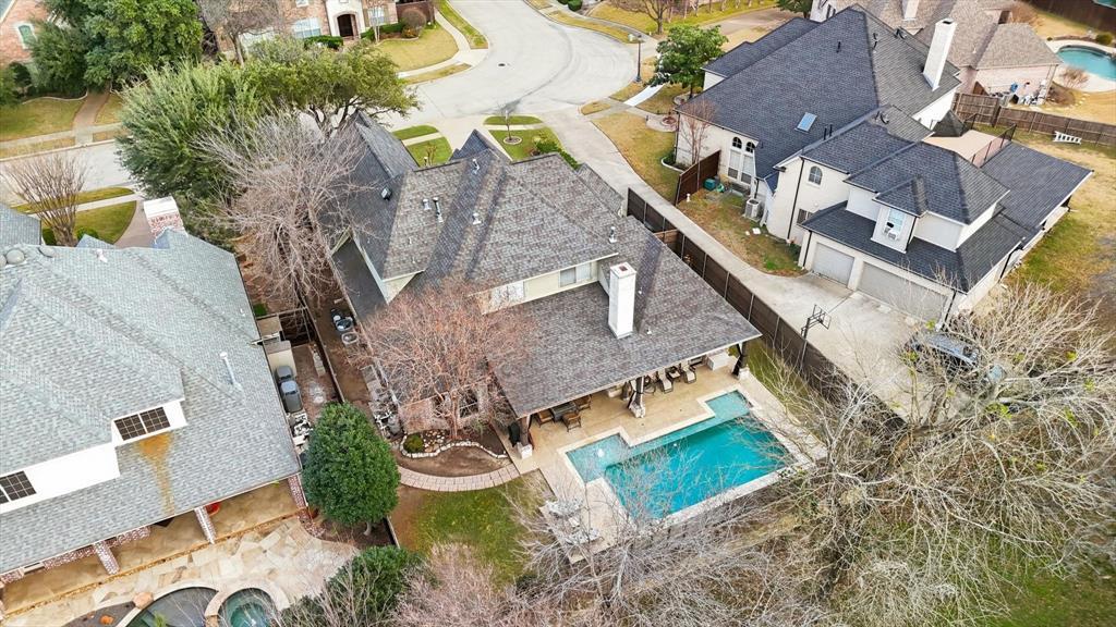 727 Madison Street Coppell, TX 75019 - Photo 33 of 36 an aerial view of a house with garden space and street view