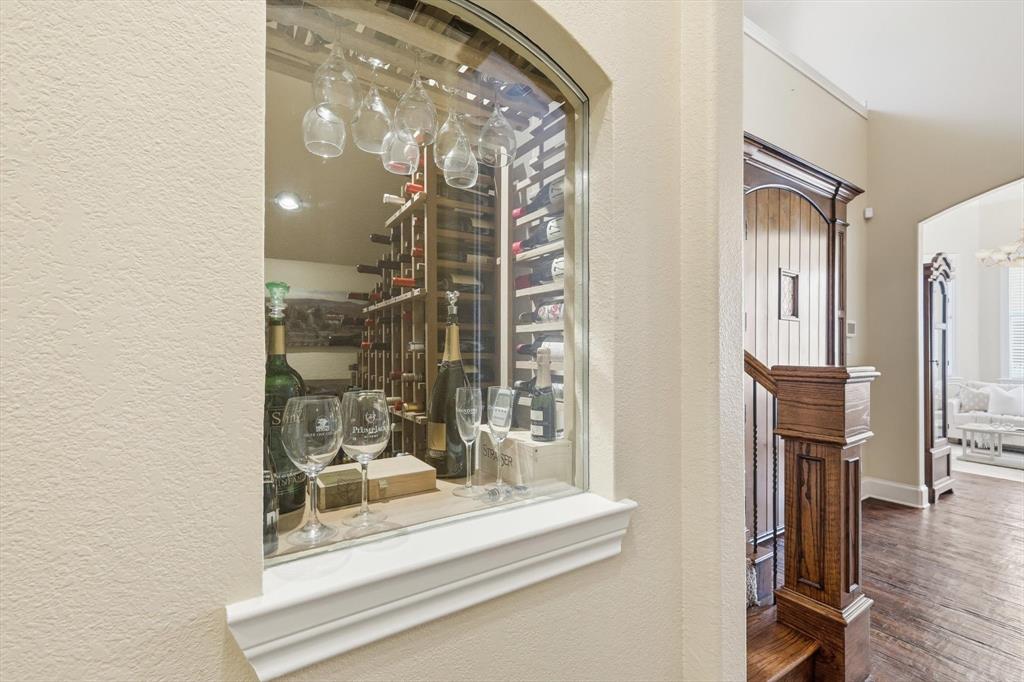 727 Madison Street Coppell, TX 75019 - Photo 4 of 36 a view of a livingroom with furniture and a fireplace