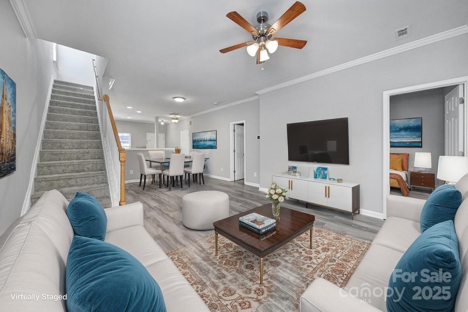 13719 Singleleaf Lane Charlotte, NC 28278 - Photo 14 of 42 a living room with furniture and a flat screen tv